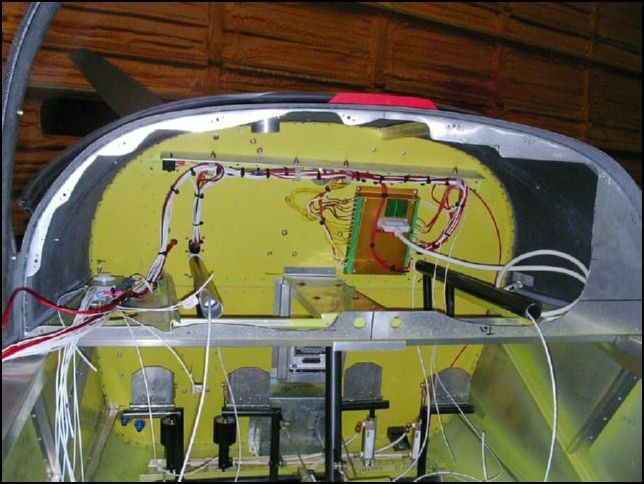 Install voltage regulator and PTT wires.  Route all electrical wires to behind the instrument panel.