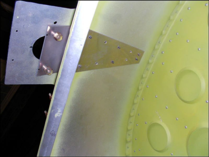 This shows the rear seatbelt attachment bracket from the inside of the bagage area.