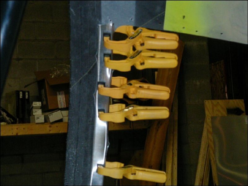 I don't like what happens to the upholstery channels when they are bent to fit the curve of the cabin.  I might remove the front and rear channel and just use a flat strip for the front and rear.  Not sure what I am going to do yet.