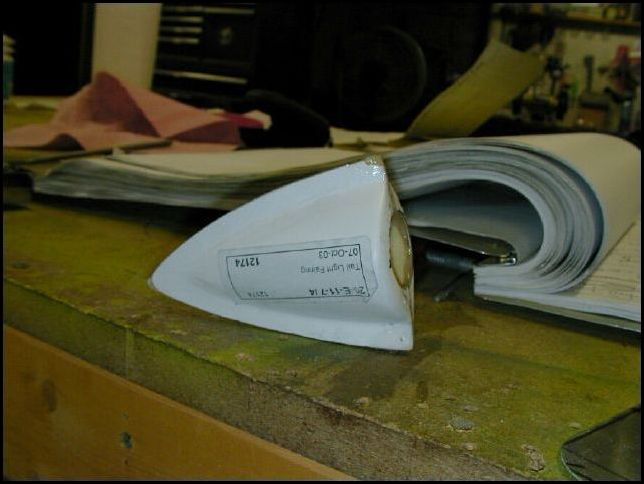 Cut 1 inch hole in 20-E-11-7 (tail-light fairing).  This part was very poorly made by Zenair, I had to repair it because it was split down the center.  No big deal though.