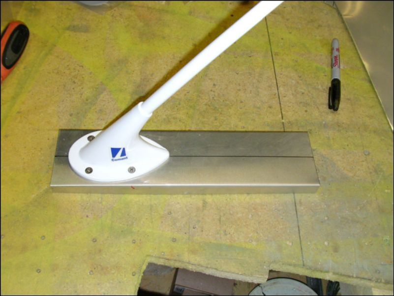Test fit the COM antennas to the mounting plates.