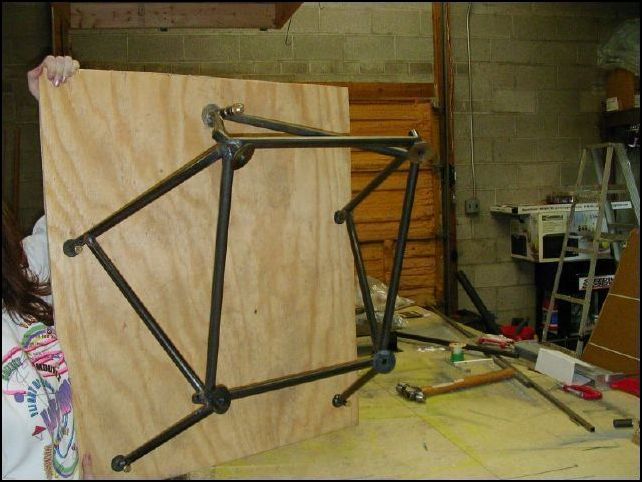 Removed engine from mount and mount from firewall and bolted the mount to plywood.  I will now take the mount to a shop in town to have them TIG weld the rest of the mount.