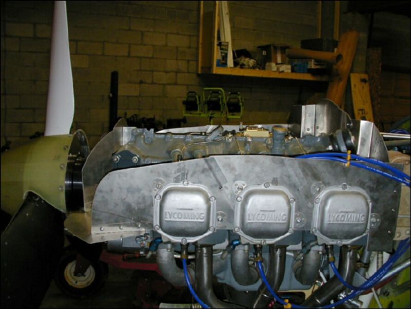 Fit the rest of the engine baffle, rivet and bolt the baffle where needed.