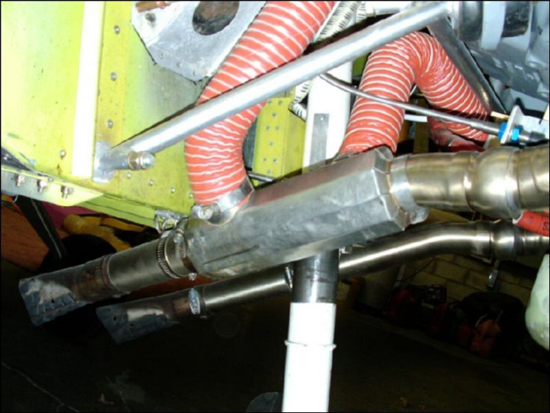 Install heat exchanger on exhaust pipe and install scat hoses.