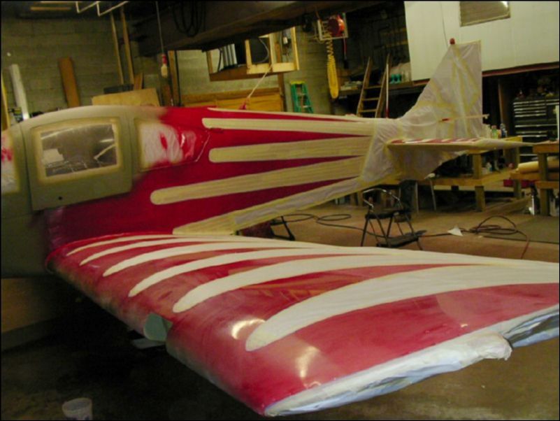 Finish masking off the aircraft to get ready to shoot the next color
