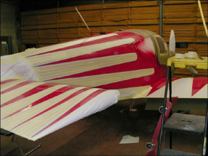 Scuff the red areas with grey scotchbrite pads then wipe with a surface cleaner.