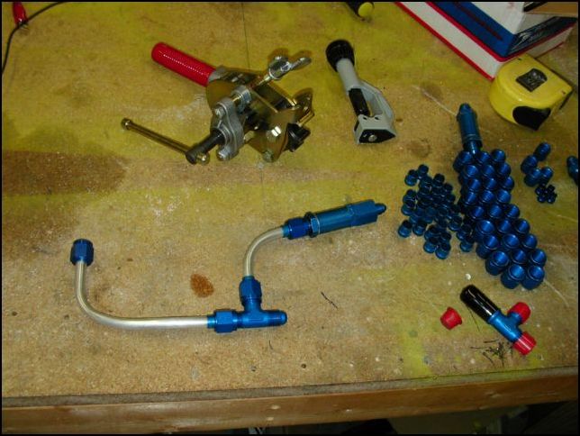 Begin the long process of installing fuel lines.  Normally this would be easy, however the system I am installing requires a return purge line and also an over pressure return line.  This image is of the the line that will connect to the right tank input on the selector which then goes to a T.  The T will have a line from the wing tank and another line from the purge system which passes through the one way flow valve and then to the top of the T.