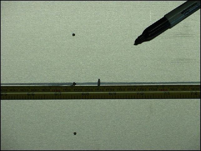 measure 1740 mm from tail end and mark center line 