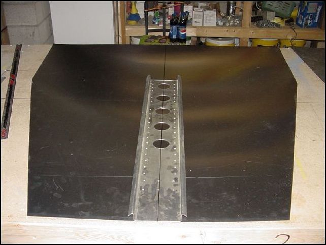 Line up the center line of the stiffener to the center line of the skin on the bottom side.  The stiffener is to be flush with the front of the skin.