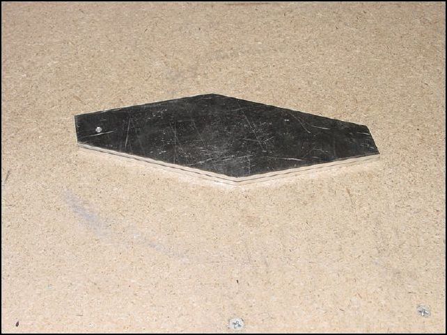 Line up the two rear wing attachment brackets (20-F-13-2) and file so that both are identical.  Mine were WAY off.