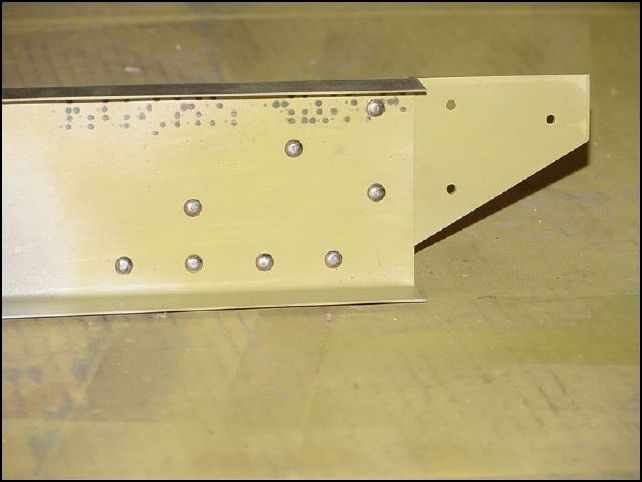 I have decided to complete this assembly and install the HT pully support assembly later when Zenair ships me the parts to make it.  So, deburr, clean, prime and rivet together