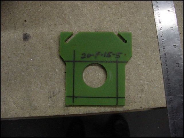 Mark 20-F-15-5 (torque tube bearing plate) 10 mm up, 10 mm in from left and right sides, and 66 mm up from bottom.  I messed this part up since when the drawings show 10 mm up and 56 mm up to the next hole.  The drawings are correct, but for some reason I marked mine 56 mm up from the bottom instead of from the 10 mm up mark.  For now just know that I marked and drilled the top holes 10 mm lower than they should have been.  OOOPS.  I have posted new pictures of this part, see pictures 57 - 59.