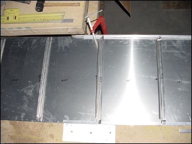 Cut six Zs 519mm 528mm 538mm 548mm 558mm and 568mm long.  Jog the ends of the Zs and position them to the side skin.