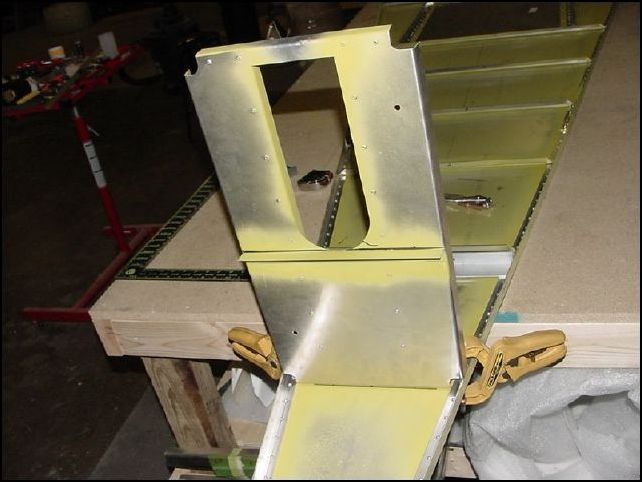 You can make a few different measurements for this step to make sure everything is working out correctly.  First measure 3374mm from the front of the rear fuselage and draw a line.  This line should be 20 mm back from the front of the rear skin.  If it is not then you do not have the proper overlap on the skins.  Position the HT frame with the rear lined up on this line.  The front should be flush with the front of the rear skin.