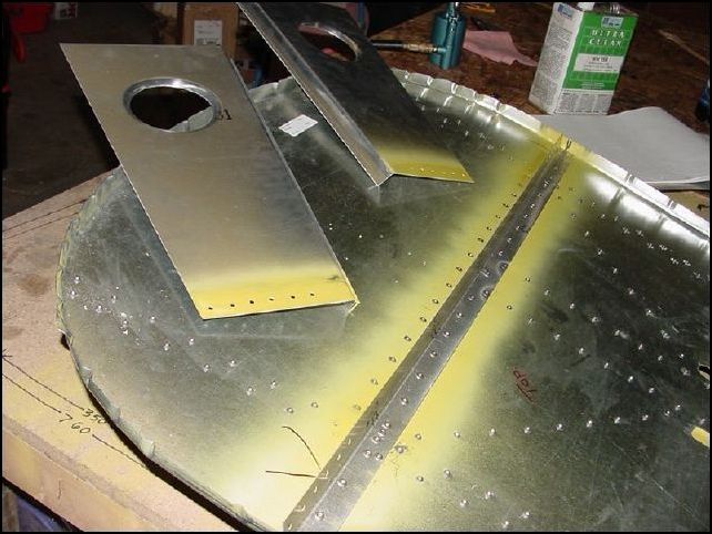 Deburr, clean, and prime the horizontal panels and rivet them at this time.