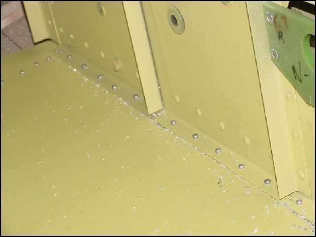 Top forward view of riveted center channel