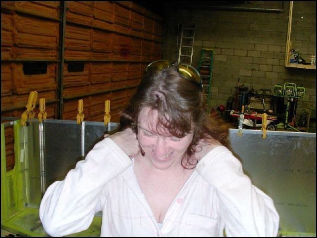 This is my wife, (Sandy), she is going to help with this next step.  Get a helper to hold the Ls and Zs in place while you drill and cleco them from the oustside of the skin.