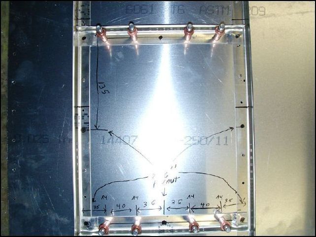 Clamp, drill, and cleco Ls for rear access door.  This is on the left lower side skin.