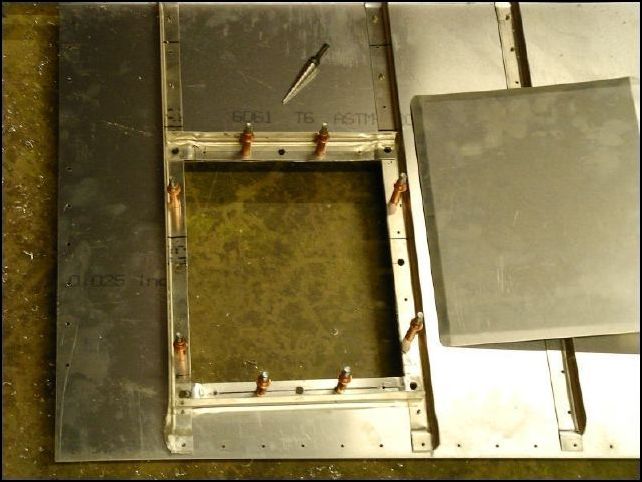 Cut hole in skin for access door.