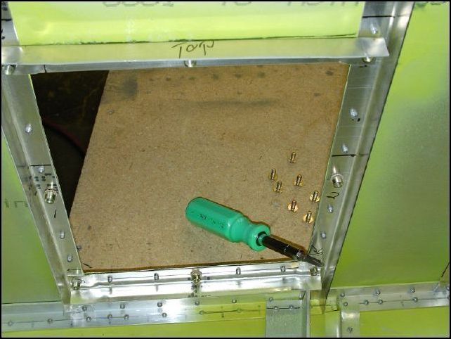 This image shows the access hole frame from the inside of the fuselage.