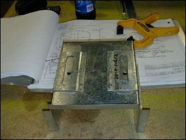 Rivet 20-F-7-6 to 20-F-7-3 on the front side.  Be sure to use SS rivets.