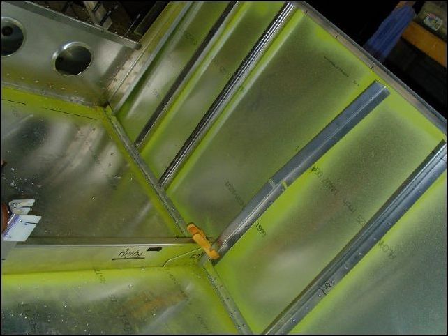 Install the gear uprights and rear horizontal attachment channel. (20-F-25-1, 20-F-25-2, and 640-F-13-3).  The I.P.L. says to drill and cleco only.  I could not see any reason for this so I have already riveted mine in place.  NOTE: 640-F-13-3 must be bent to fit the rear seat back.  To do this measure up 260mm and drill a 1/4