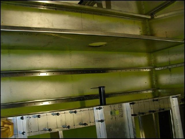 Rivet the gear floor siffeners and rear seat front support.