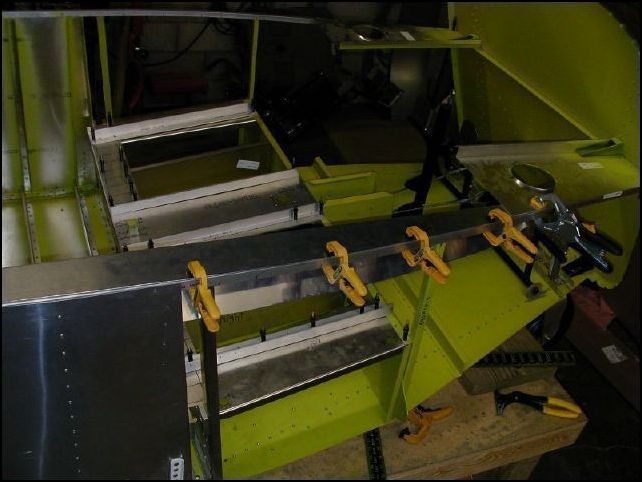 As you can see from this photo, the top longeron doubler / armrest now fits nicely flush to the side of the fuselage.