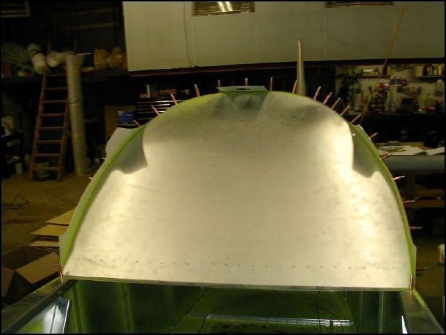 I drilled all the rivet holes for bulkhead 3 in a previous step so now I just had to cleco it back in place.