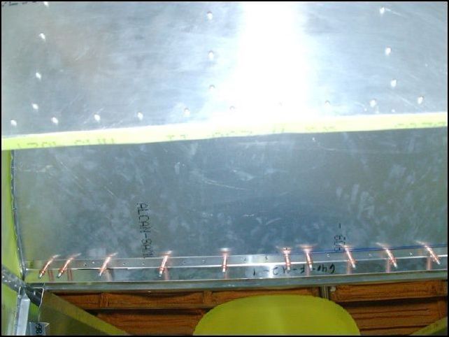 Trim 640-F-42-1 (Horizontal stiffener) to fit behind bulkhead 3 on top of the top longerons.  Drill and cleco in position A4 P40.