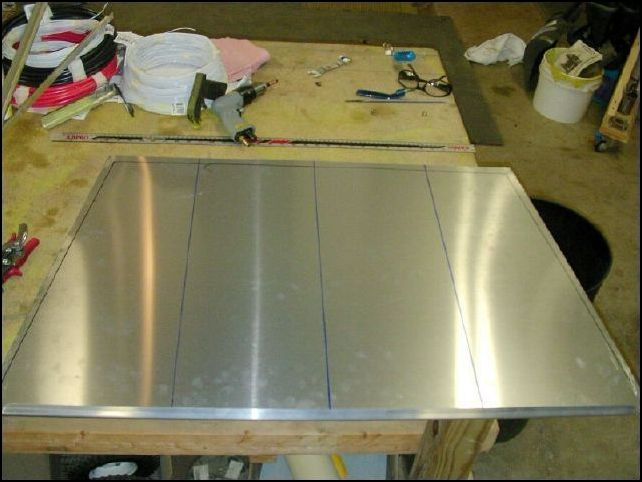 Measure fuselage and cut baggage compartment floor to fit.  Then mark the locations of the floor stiffeners (standard Ls) as per drawings.  I also marked the skin to show where the longerons overlapped.