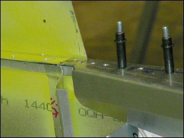 Cut the longeron doublers to fit under bulkhead 3 at teh longerons.  My doubler does not go as far behind the bulkhead as the drawings show.  This is because I followed the drawings when I  cut my longeron doubler and the drawings show it as being 360 mm from the front of the doubler to the firewall.  However another drawing shows the front of the doulber as being bolted to 640-F-14-1 and that drawing shows the bolts at 10mm then 25mm then 25mm from the rear of 640-F-14-1.  Well, these two drawings show two different positions for the doubler.  So, I did the bolts as they show them and then added rivets two more rivets P20 in front of the bolts.  This means that my doulber is about 45 mm to far forward by one drawing and perfect by the other drawing.  Which one is correct?  I don't know, but I also do not see any reason to remove my doublers and change the position.  Just as a side note, the IPL also says that 640-F-14-6 is 360 mm from the firewall, however the drawings show this part as being lined up with the rear of 640-F-14-1... again... which is correct?  
