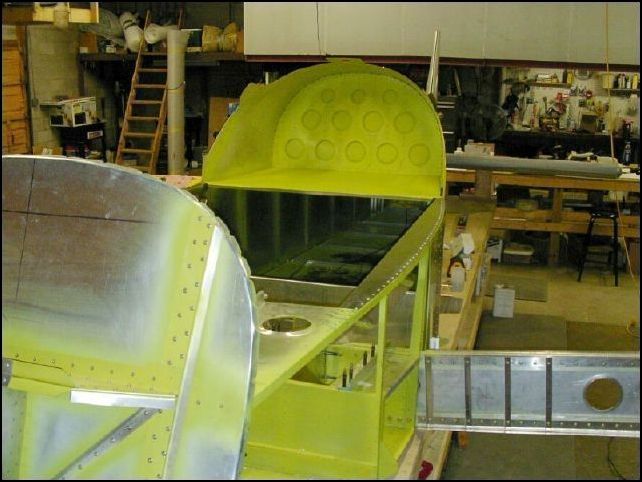 Rivet the baggage floor and top longeron doublers