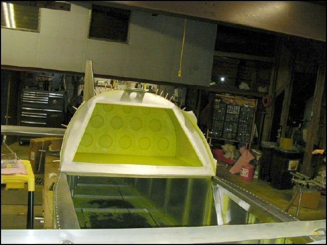 Cleco bulkhead 3 to the fuselage and rivet the baggage floor to the bulkhead.  I am not going to rivet the skin to this bulkhead at this time since there will be another skin that overlaps this and I would think that you would want to rivet them both at the same time.