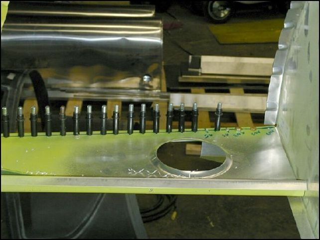 Complete drilling and clecoing the front horizontal panel to the top longerons.