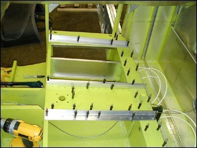 Deburr, clean, prime and re-coleco all of the front seat channel parts.