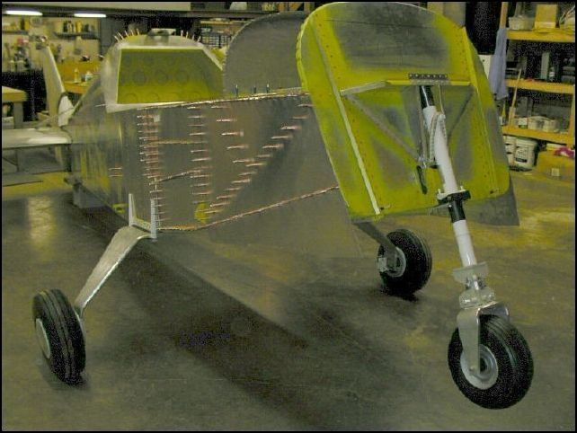 This is the fuselage on it's main gear.  The nose is a bit light right now so we will build a support for the tail so that the nose gear will be on the ground soon.