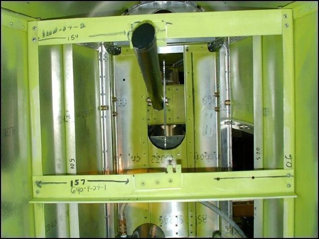 Another image of the horizontal tail stops riveted to the fuselage.