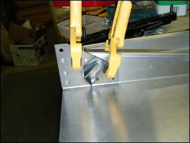 Clamp the front seat back supports to the front seat bottoms, drill and cleco them in place.