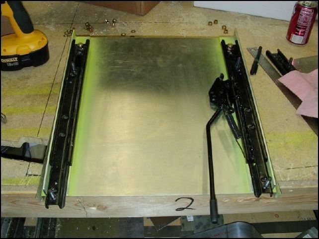 Bolt the seat rails and slides to the bottom of the front seats.