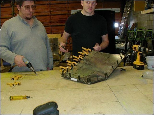 Now remove the seat back frames and clamp the seat back panel to the frames.  Drill and cleco the panel in place.