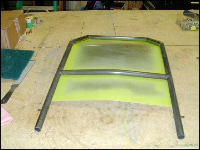 Deburr, clean, prime and rivet the seat back panels to the seat back frames.