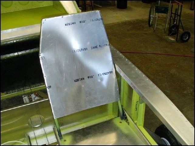 Install the seat back to the front seats.