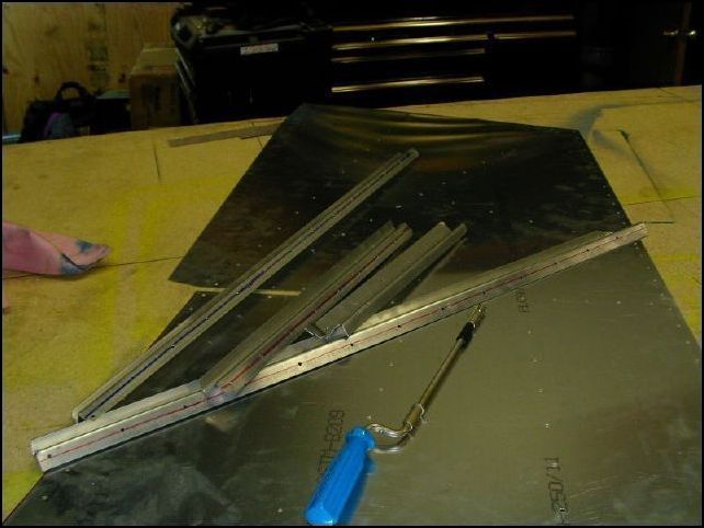 Remove front lower fuselage skins.  Deburr, clean, and prime.