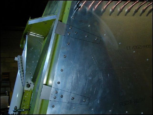 Position the cowling pickkups under the front of the front lower fuselage skins as per drawings.  Drill, cleco, remove, clean, prime, and then rivet with A5 SS rivets.  I used SS rivets for the entire front of this skin.