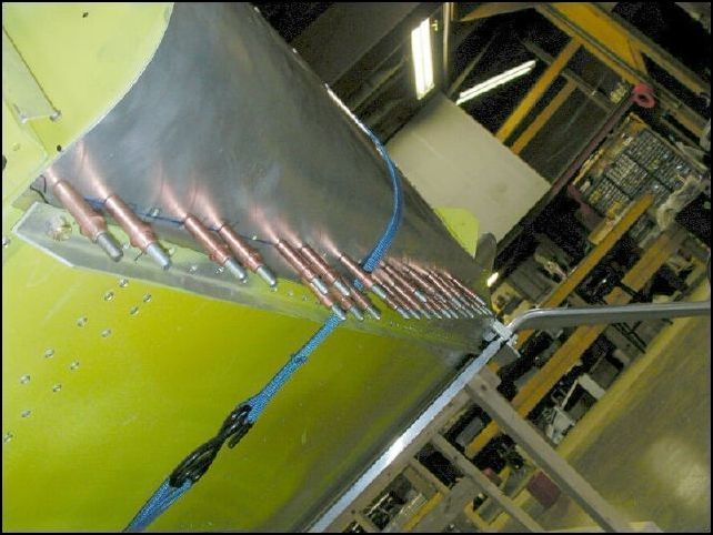 Drill and cleco the bottom of the front skins to the fuselage A4 P35 two lines.