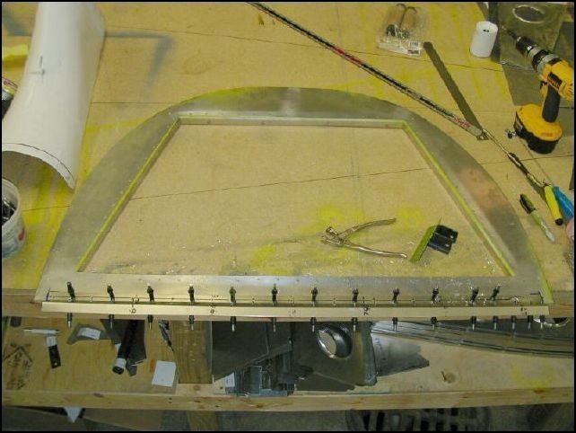 Another image showing the rear seat top Z clecoed to bulkhead 3.