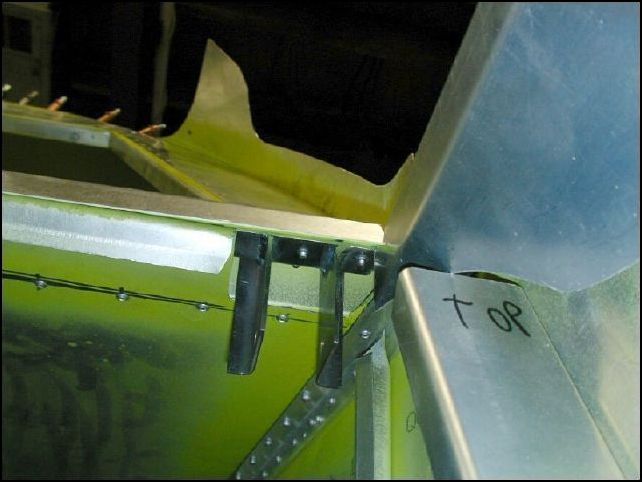 This is the flap motor bracket mounted behind bulkhead 3.