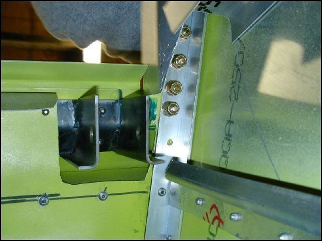 Another image of the flap motor bracket.