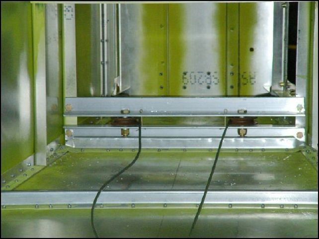 Another image of the rudder pulleys bolted to the fuselage.